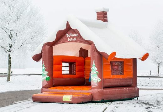 Skihut winterworld bouncer with a 3D chimney at the top for children. Buy bouncers online at JB Inflatables UK