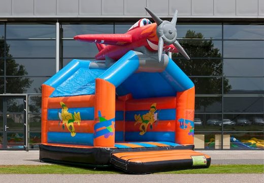 Standard airplane bouncy castle for sale in striking colors with a large 3D object for children on top. Buy indoor inflatables online at JB Inflatables UK
