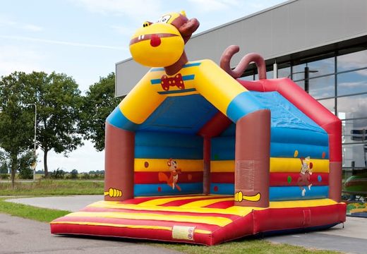 Super bouncy castle with roof in monkey theme for kids. Buy bouncy castles online at JB Inflatables UK