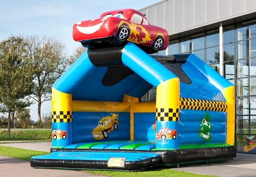 Super bouncy castle with roof in car theme for kids. Buy bouncy castles online at JB Inflatables UK