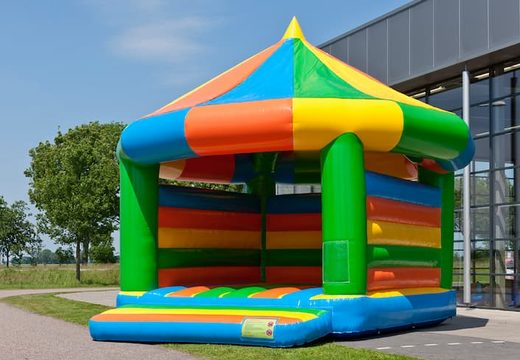 Carousel super bouncy castle covered in standard theme for kids.  Buy bouncy castles online at JB Inflatables UK  