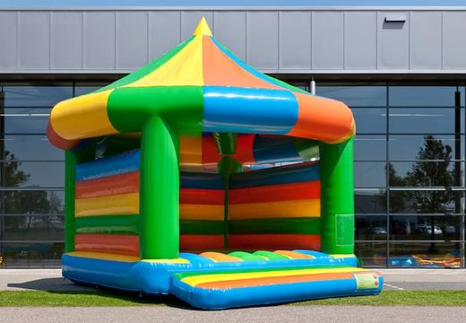 Big carousel bounce house with roof for kids. Order bounce houses online at JB Inflatables UK  