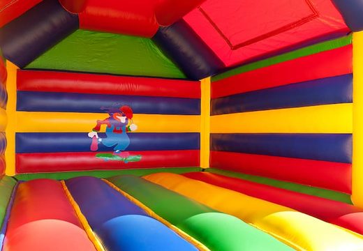 Big inflatable bouncy castle with roof in circus theme to buy for kids. Order online bouncy castles at JB Inflatables UK