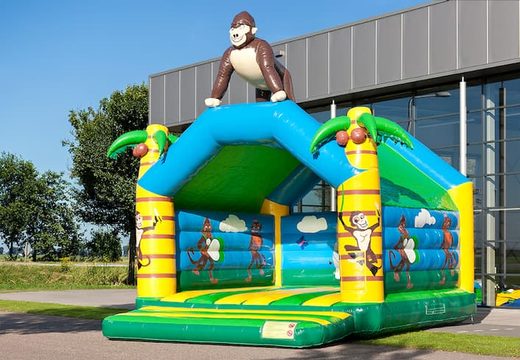 Super bouncy castle with roof in jungle theme for kids. Buy bouncy castles online at JB Inflatables UK