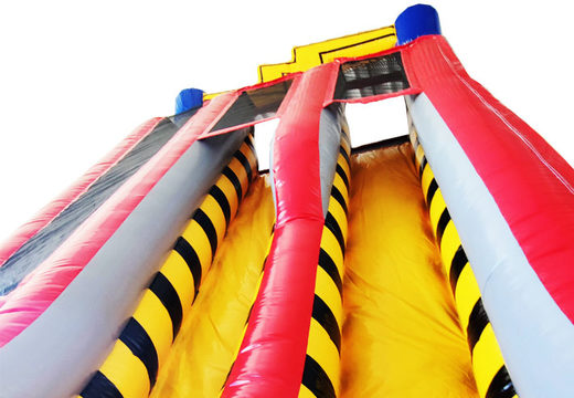 Order an inflatable large slide in combination with water in a high voltage theme
