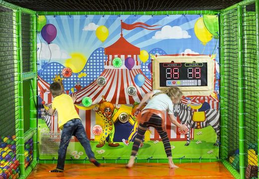 Interactive wall with circus themed spot in the front of a playground for sale at Jb