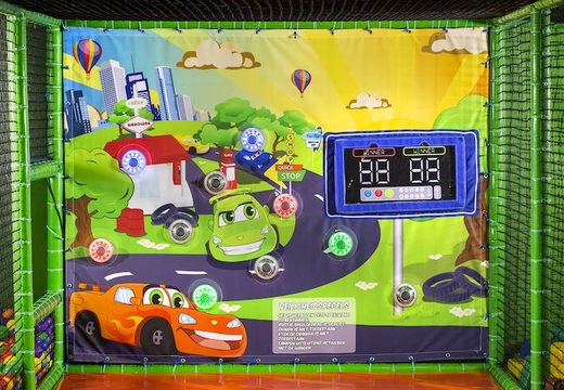 Playground wall with interactive spots in it to play games for children in car theme