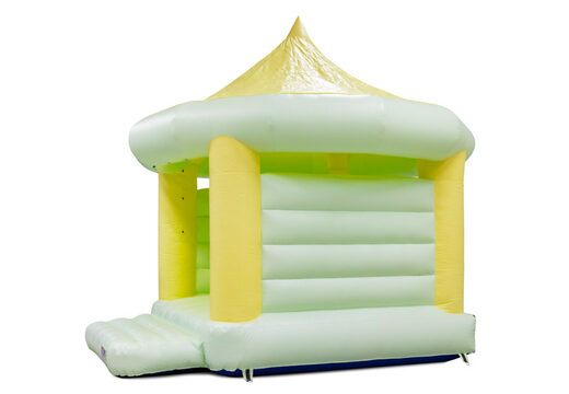 Standard carousel bounce houses for sale in pastel colors yellow green for children. Buy indoor bounce houses online at JB Inflatables America
