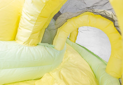 Buy bouncer with slide air cushion in pastel colors yellow green for children. Order air cushions online at JB Inflatables America
