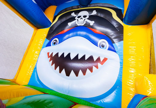 Buy an inflatable bouncy castle in a pirate theme with slide and play object